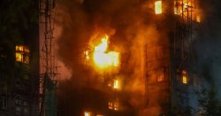 Three arrested in Hong Kong as tower blocks fire leaves at least 44 dead