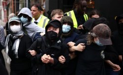Clashes as Oxford Union debating society hosts Tommy Robinson