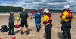 Man airlifted to hospital after trying to open beer at Wales beach